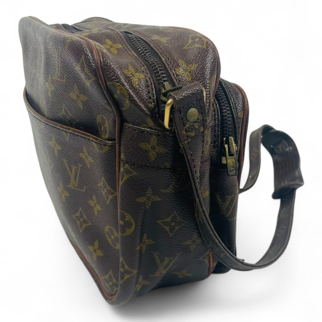 LOUIS VUITTON Monogram Migrateur Shoulder bag 201